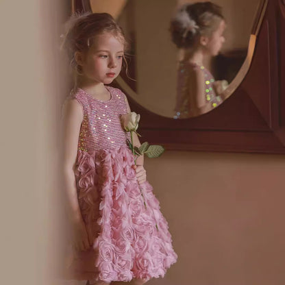 Girl in Pink Sequined Flower Dress looking right