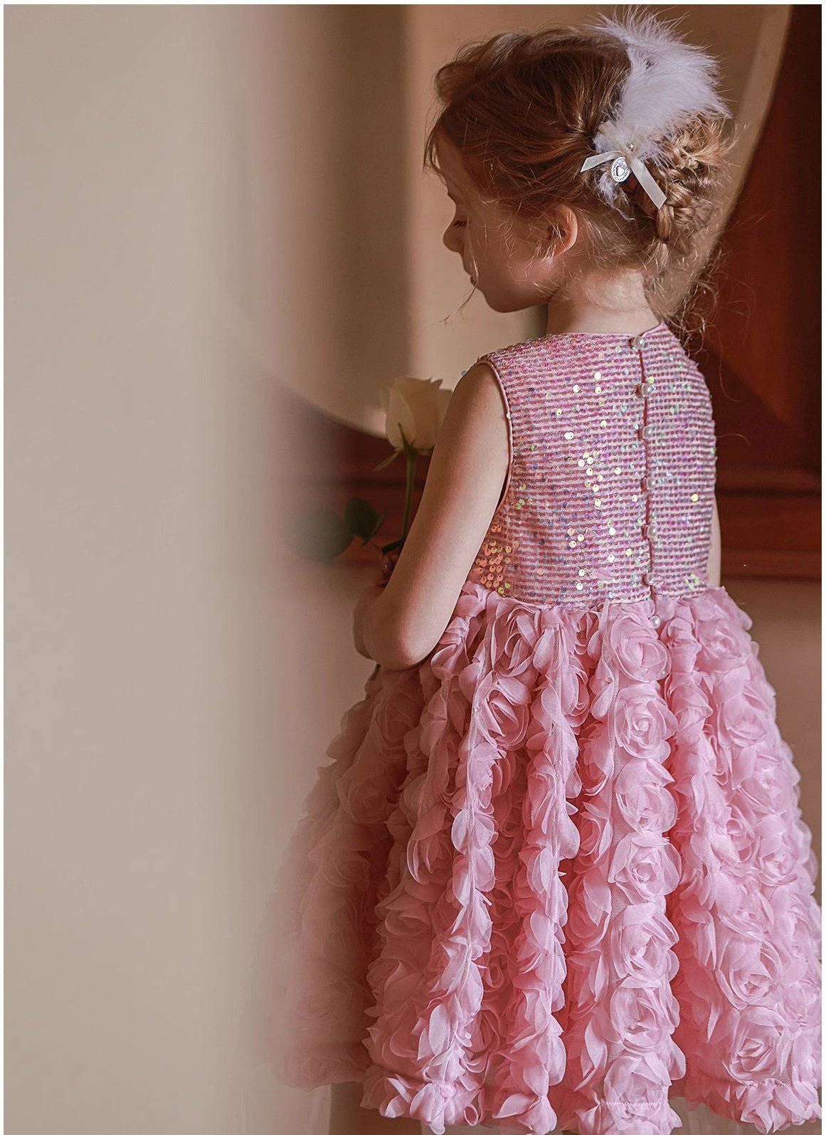 Girl in Pink Sequined Flower Dress back