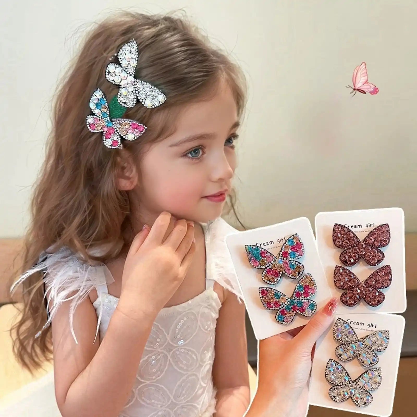 Young girl wearing a butterfly hair clip with a display of similar clips in the background.