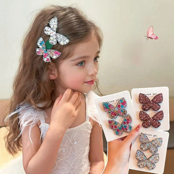 Young girl wearing a butterfly hair clip with a display of similar clips in the background.