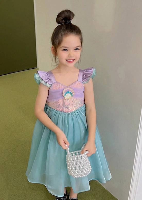 Young girl in a Green Purple Sequins Sleeveless Mermaid Princess Dress holding a small handbag.