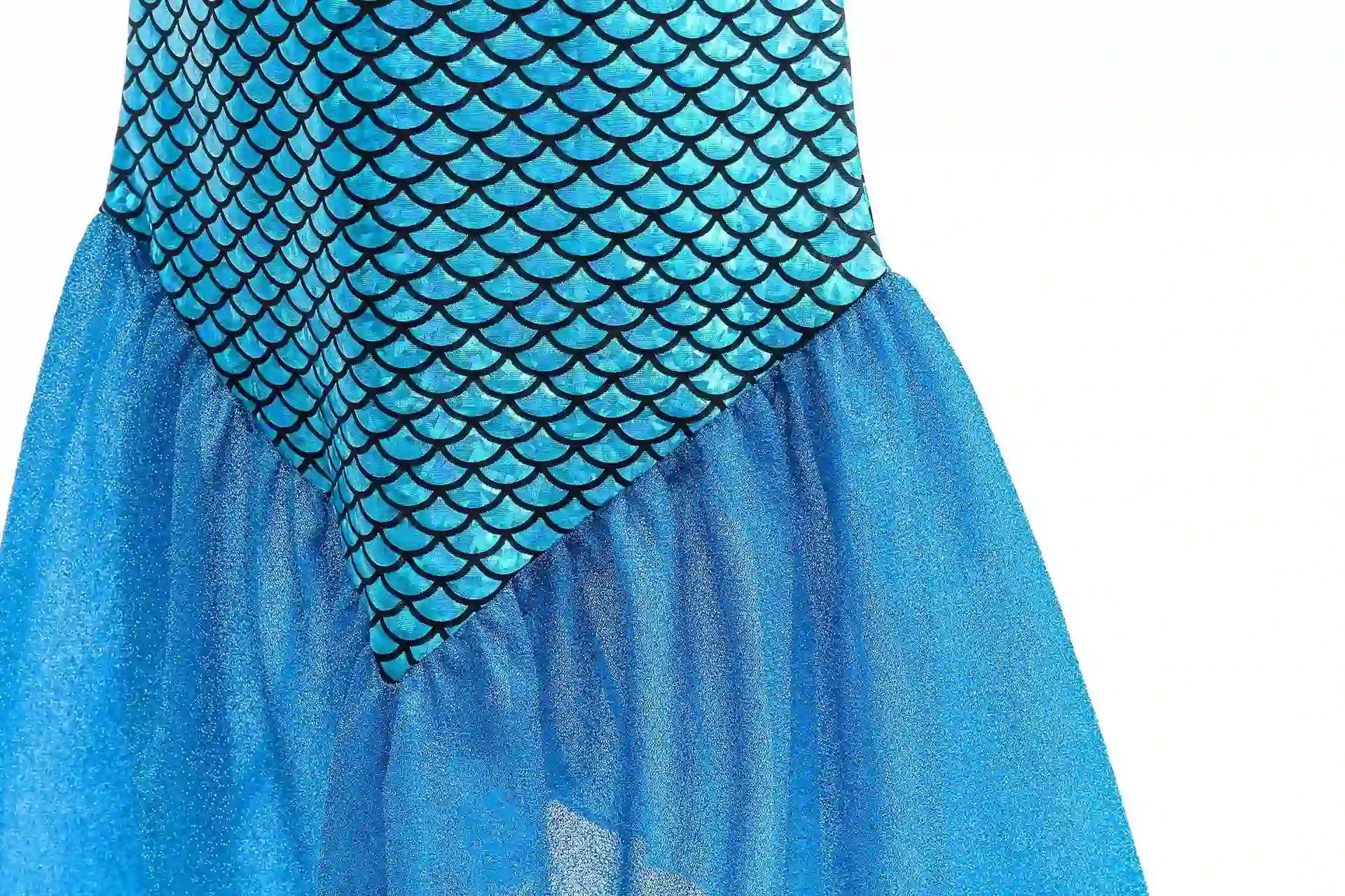 Blue dress with fish-scale pattern on a white background