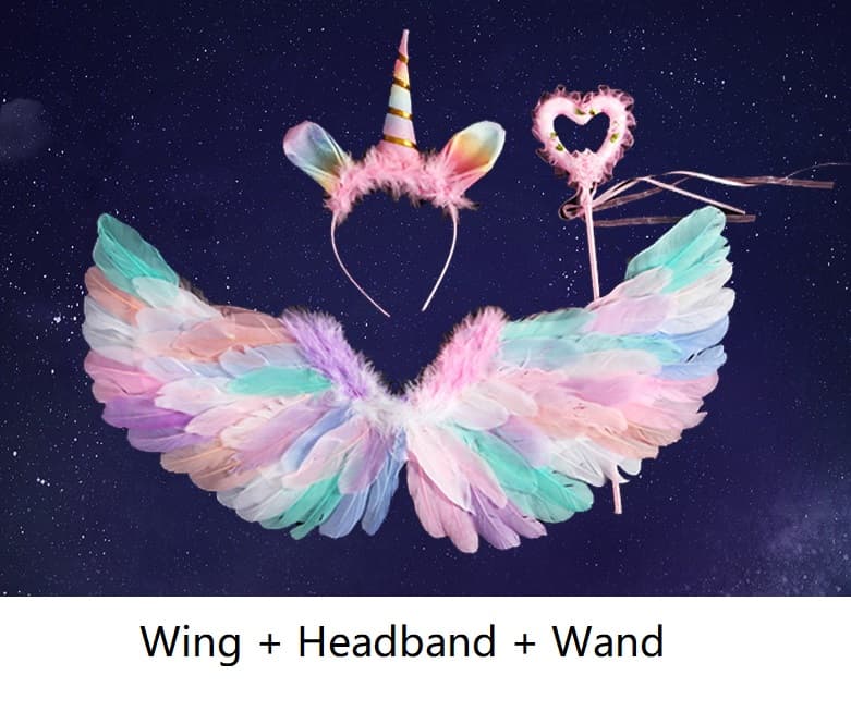 Pastel-colored fairy wings, headband with unicorn horn, and heart-shaped wand on a dark space-themed background.