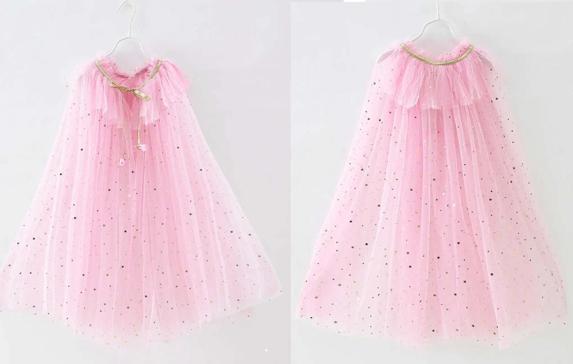 Pink tulle cape with gold accents on hangers against a white background