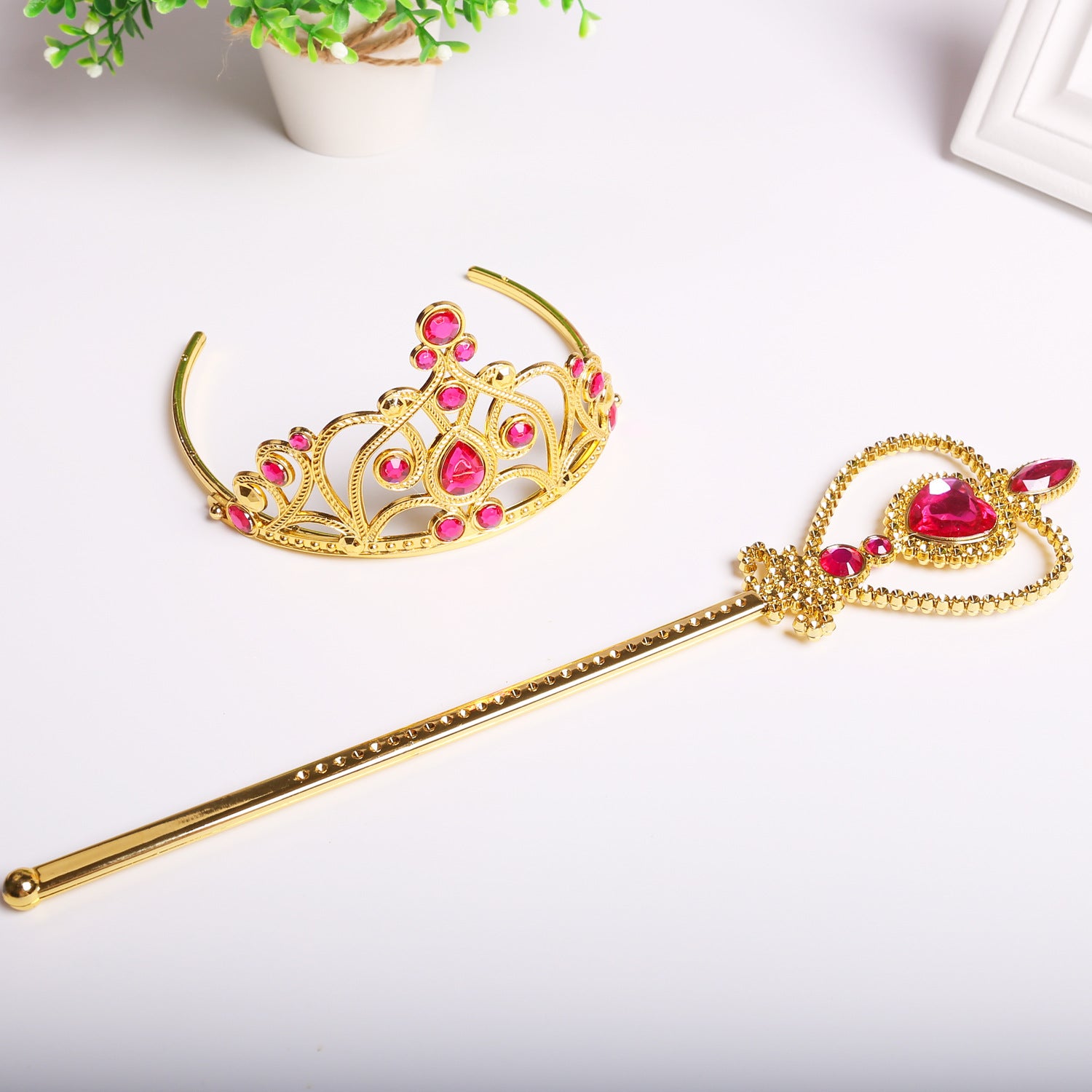 gold and pink princess crown and wand