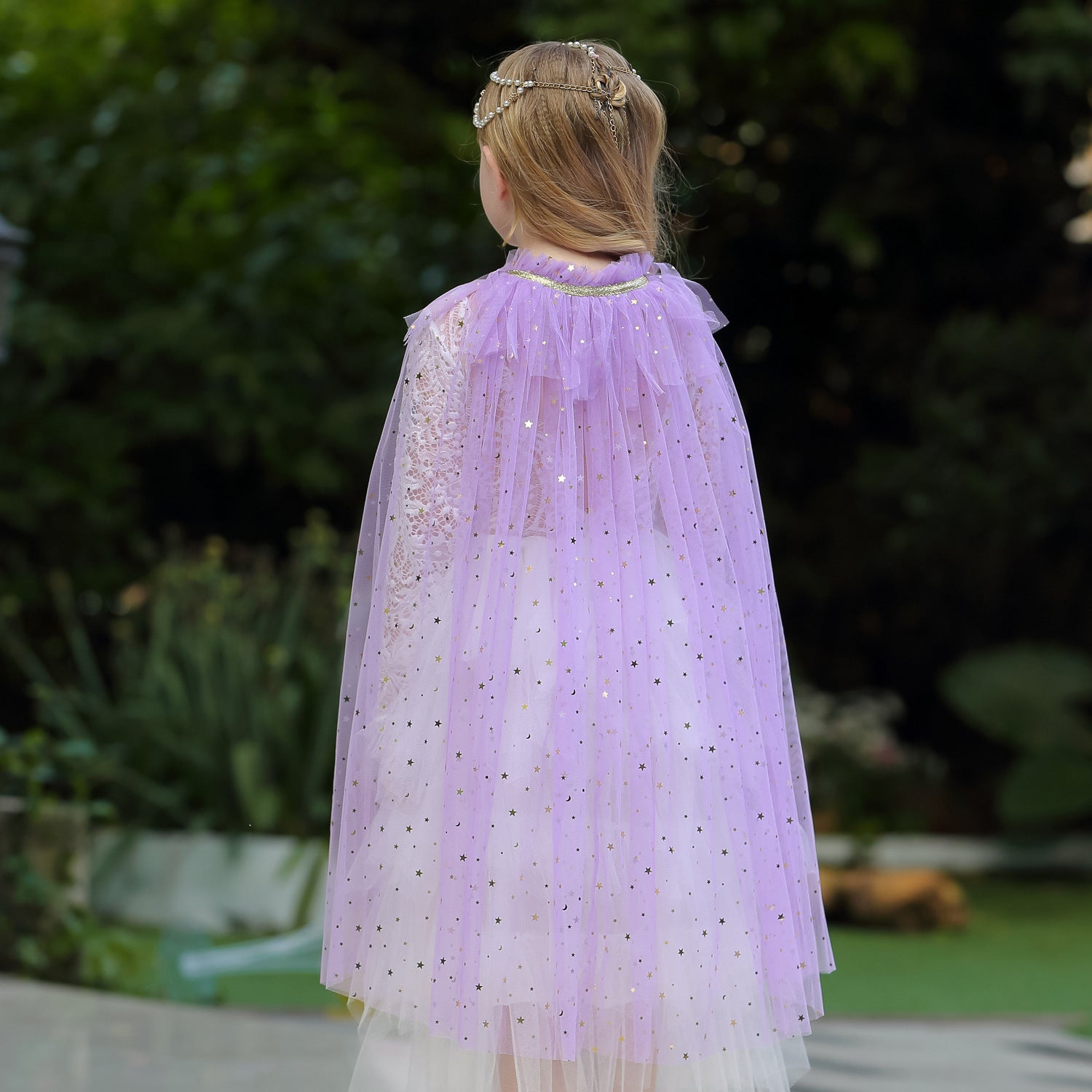 girl with purple tulle princess cape back